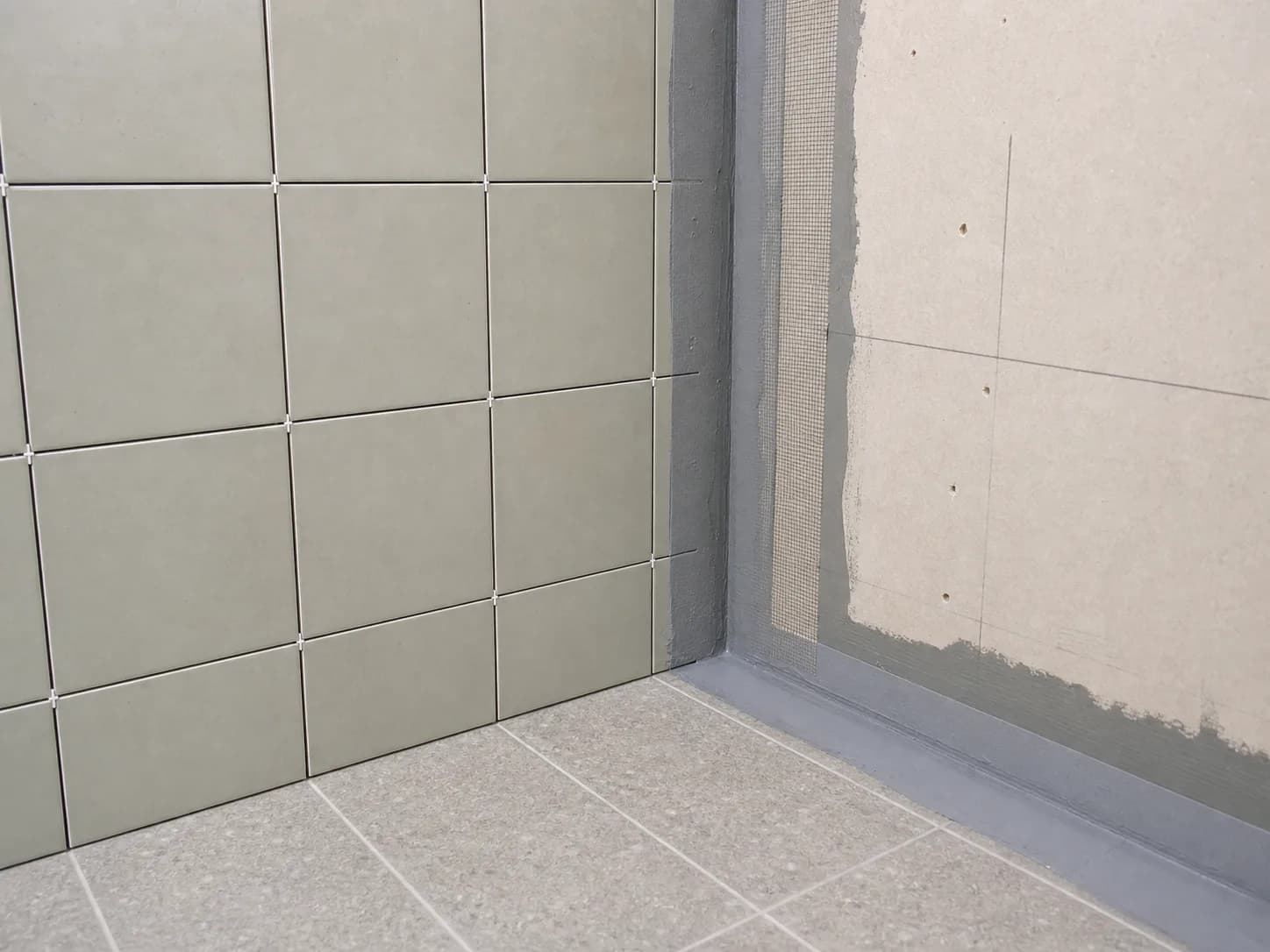 Bathroom vanity, tiled wall and wet-area renovation details