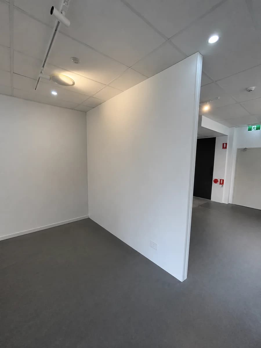 Same commercial interior after wall and floor finishing