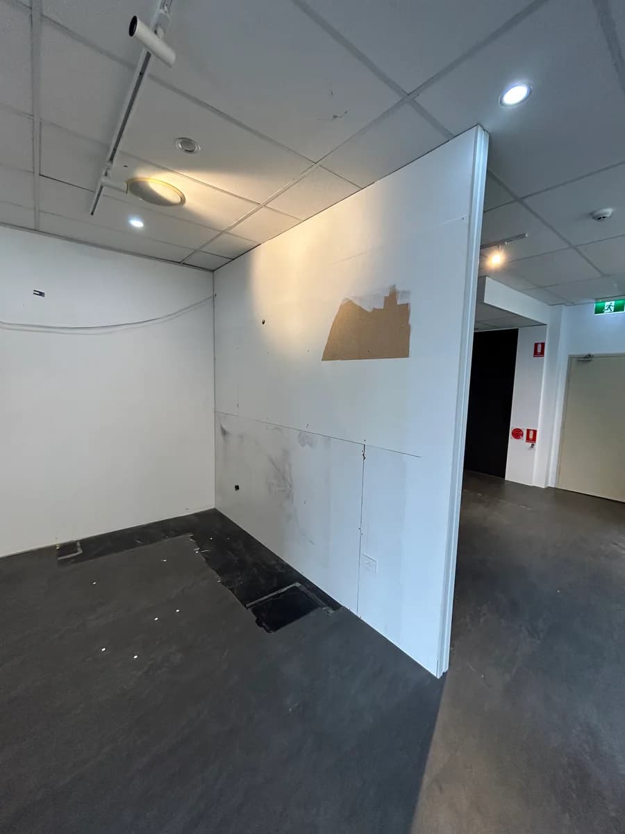 Commercial interior with unfinished walls and floor before the fit-out