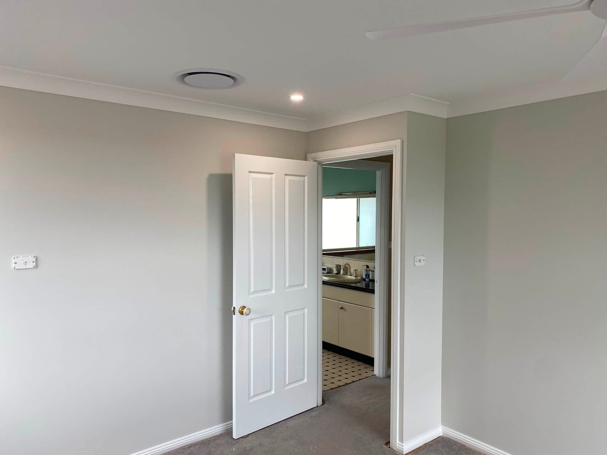 Finished interior door, architrave, skirting and painted wall in a Mel One project